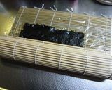 A picture of step 6 of California Rolls with Cured Ham.