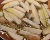 A picture of step 2 of Fried potatoes - garlic, rosemary, thyme.