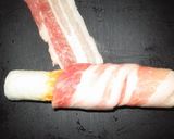 A picture of step 4 of Asparagus in Chikuwa Wrapped in Pork Belly.