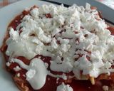 Foto del paso 7 de la receta: Enjitomatadas rellenas de pollo