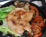 A picture of step 9 of My Sizzling Chicken on a platter 😆.