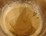 A picture of step 9 of Vanilla Layer Cake with Lemon Cream Filling and Lemon Whipped Cream Frosting.