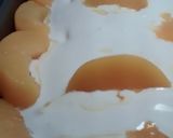 A picture of step 5 of Beckie's Peach Jello Cake.