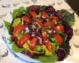 Une image de l'étape 9 de Salade de laitue frisée, trévise et tomate cœur de bœuf.