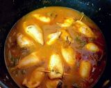 Foto del paso 9 de la receta: Chipirones frescos rellenos en salsa de cebolla y tikka curry