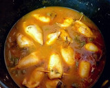 Foto del paso 9 de la receta: Chipirones frescos rellenos en salsa de cebolla y tikka curry