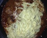 A picture of step 4 of Pork and beef meatballs in a slow braised tomato sauce and pasta.