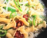 A picture of step 6 of Short Pasta with Dried Tomatoes and Green Peppers.