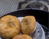 A picture of step 21 of Dal Bafla Baati Churma.