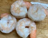 A picture of step 2 of Scrambled egg with shrimp on rice.