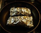 A picture of step 4 of Foil Cooked Scallops and Mushrooms.