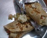 A picture of step 11 of Potato wraps with cucumber relish and caramalised onions.