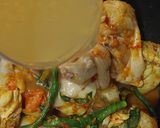 Foto langkah ke 3 dari resep Ayam Woku Kemangi.