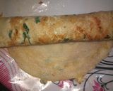 A picture of step 4 of Egg Dosa masala roll.