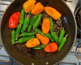 A picture of step 2 of Cumin-fried pardon peppers.