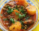 A picture of step 3 of Peas Potato and Brinjal Curry.