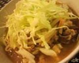 A picture of step 9 of Dan Dan Noodle Hot Pot with Lots of Cabbage and Bean Sprouts.