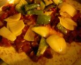 A picture of step 12 of Turkey Quesadilla Pizzas.