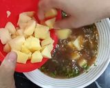A picture of step 3 of Aloo Dum.