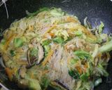 A picture of step 9 of Stir-fried Bifun Noodles with lots of Spring Cabbage and Sweet Onions.