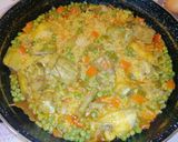 Foto del paso 7 de la receta: Arroz meloso con pollo y alcachofas