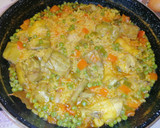 Foto del paso 7 de la receta: Arroz meloso con pollo y alcachofas