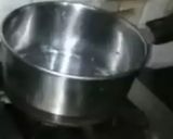 A picture of step 3 of Ashtami special prasaad the puri chana and halwa thali.