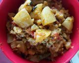 A picture of step 2 of Cauliflower, carrot and potato/ veg/ with salad and chapati.
