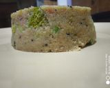 A picture of step 3 of Upma with lots of veggies.