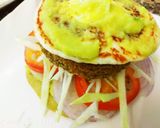 A picture of step 10 of Semolina Avocado cake  veg burger with dal tikki  and stick.