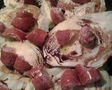 A picture of step 2 of Balsamic vinegar roasted cabbage and sausage.
