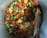 A picture of step 1 of Cauliflower with green peas and carrot potato.
