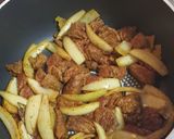 A picture of step 2 of Citrus beef curry.