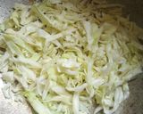 A picture of step 3 of Fried plantain with steamed cabbage and egg.
