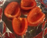 A picture of step 1 of Eggs in Roasted Roma Tomatoes.