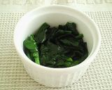 A picture of step 1 of Eggs en Cocotte (Shirred Eggs) with Spinach, Mayonnaise and Cheese.