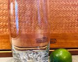 A picture of step 1 of Spiced Rum 🍹 Cola Lime Rickey.