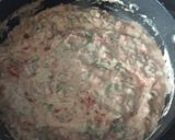 A picture of step 8 of Creamy Sausage Tomato Tortellini.