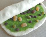 A picture of step 6 of Twisted Soy Milk Bread with Amanatto (Candied Beans) and Green Tea.