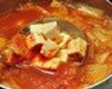 A picture of step 4 of Kimchi Soup with Tofu and Asari or Manila Clams.