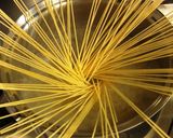 A picture of step 3 of Firefly Squid and Nanohana Spaghetti.