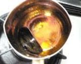 A picture of step 3 of Melt-in-Your-Mouth Pumpkin Custard Pudding.