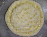 A picture of step 14 of Aloo walay nan.