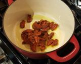 A picture of step 4 of Chorizo Braised Chicken Thighs with Chickpeas.