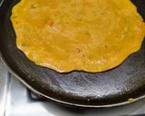 A picture of step 4 of Masala Besan Chilla with Thin Crust.