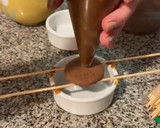 Foto del paso 5 de la receta: Alfajores - Copitos de dulce de leche bañados en chocolate 🤍