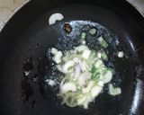 A picture of step 2 of Jollof cous cous.