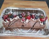 Foto del paso 8 de la receta: Brazo de chocolate y frutos rojos
