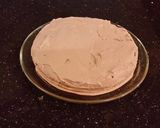 A picture of step 13 of Hazelnut Layer Cake with Hazelnut Cream Frosting.
