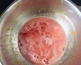 A picture of step 2 of Watermelon Lemonade Popsicles.